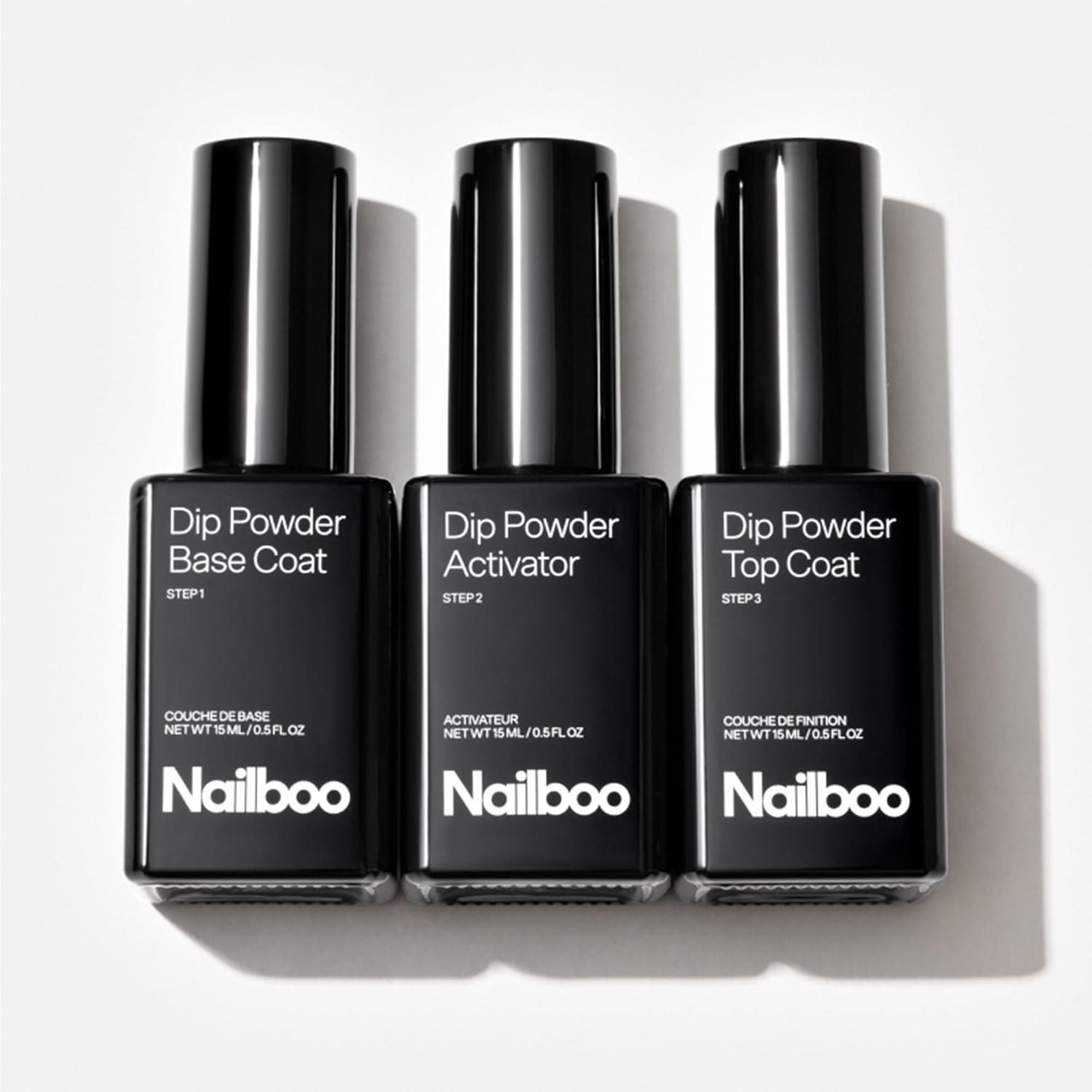 Nailboo Dip Powder Liquid Set front view showing the base coat activator and top coat bottles.