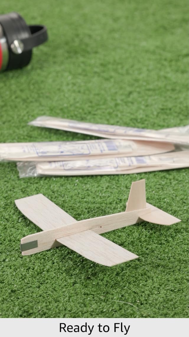 A group of thirty six customized craft model planes lined up ready for a summer camp activity.