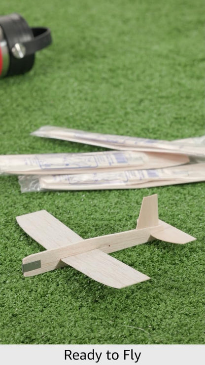 A group of thirty six customized craft model planes lined up ready for a summer camp activity.