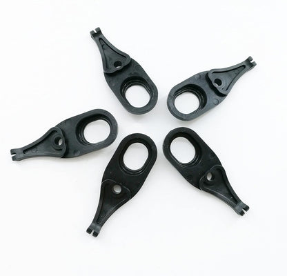 Pack of five black plastic turning levers compatible with professional livestock clippers