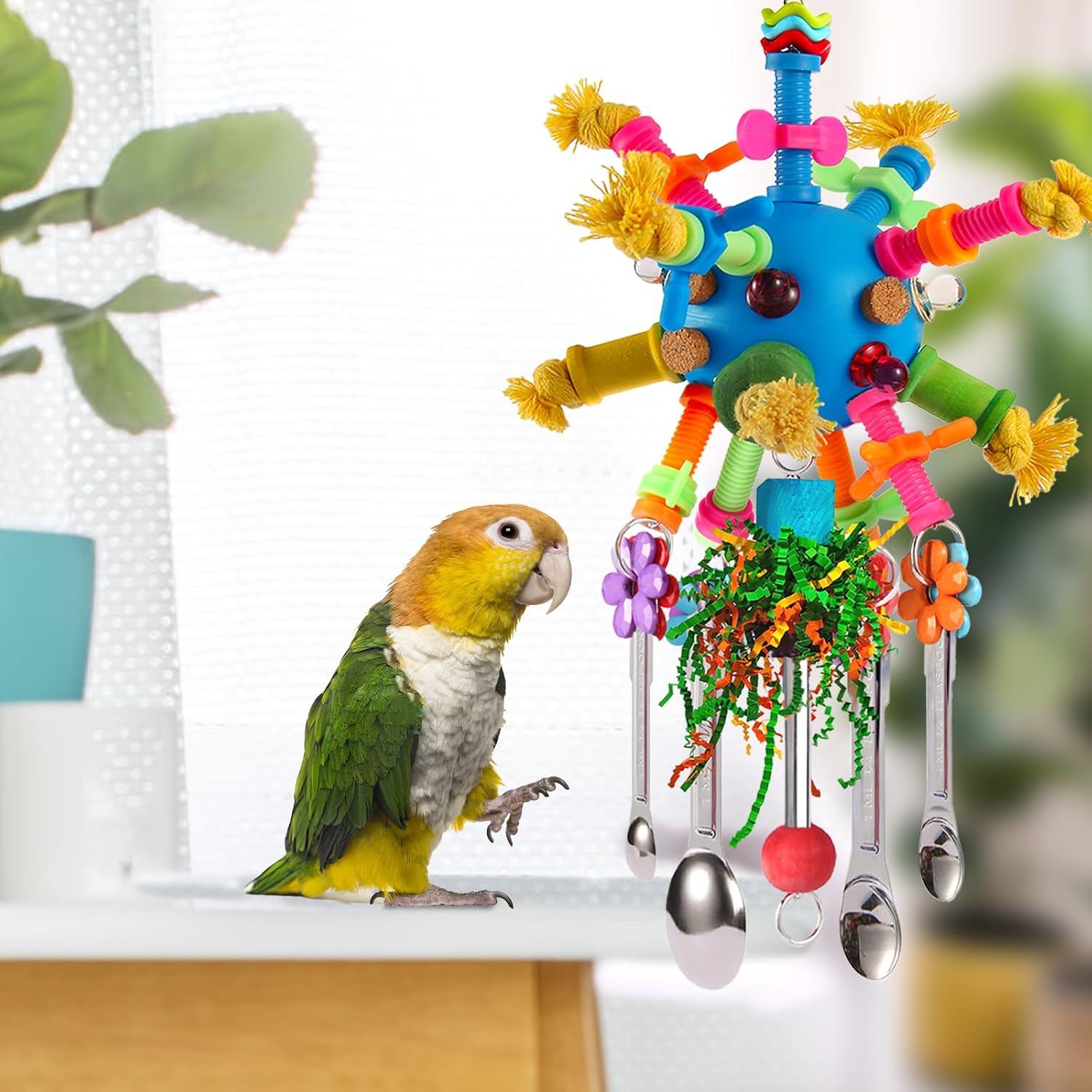 Interactive pullable spoons and colorful acrylic blocks on a bird enrichment toy