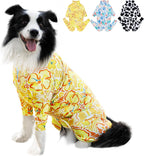 Dog relaxing comfortably in ExploreU surgical recovery suit