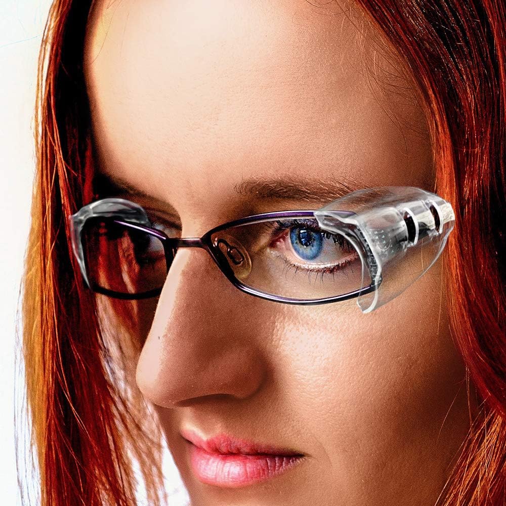Three pairs of transparent eyeglass temple protectors laid out flat