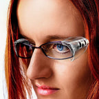 Three pairs of transparent eyeglass temple protectors laid out flat