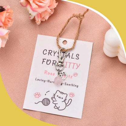 Side profile of Ancnoz crystal cat charm for pets.