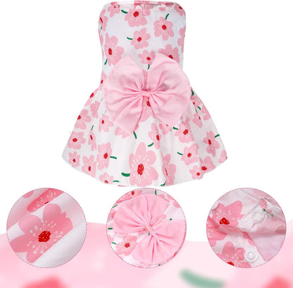 Side view of a small puppy wearing the classic vest style pink pet skirt.