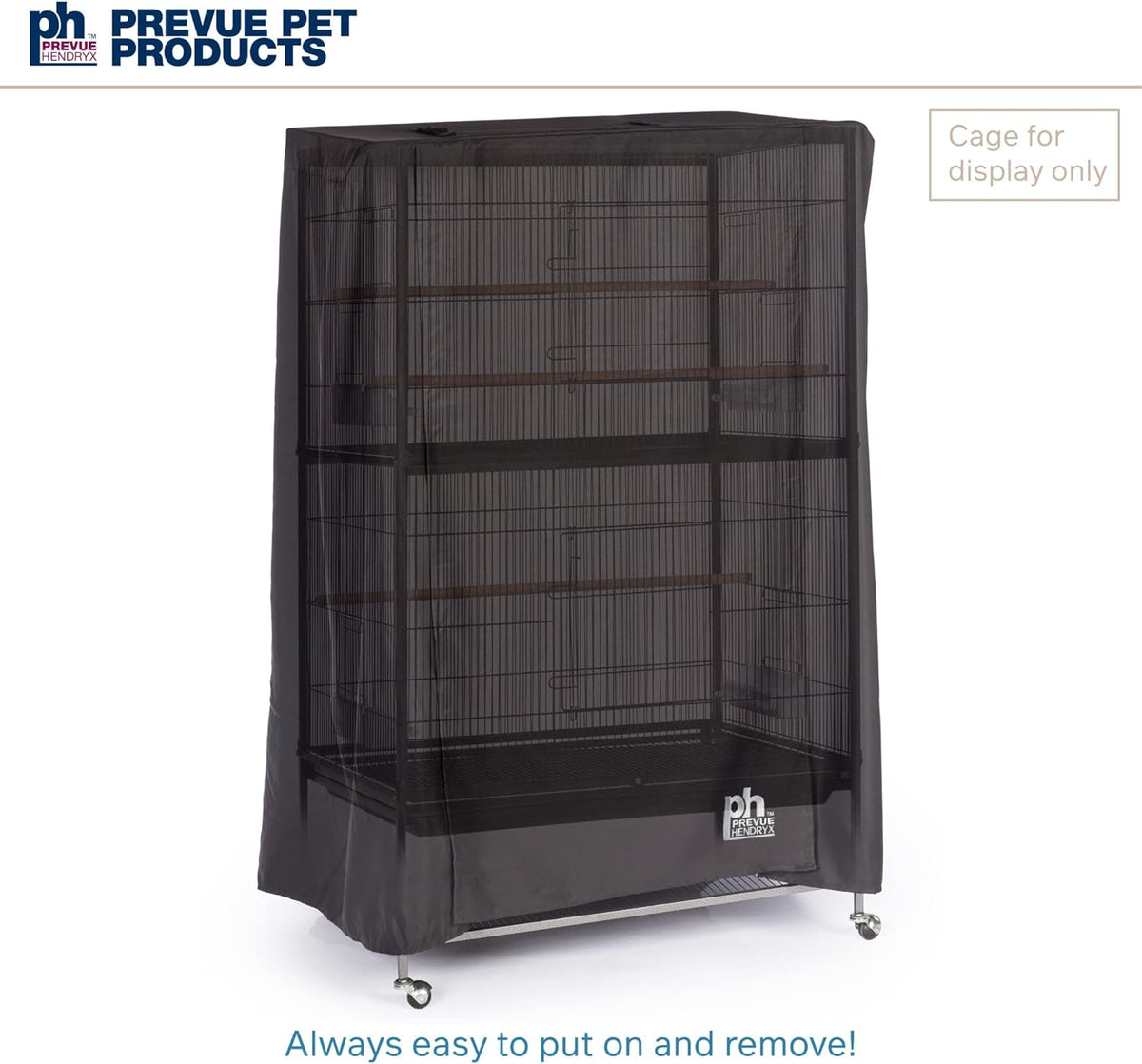 Bird cage cover draped over a large rectangular metal cage