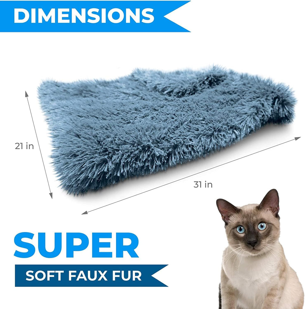 Cozy washable throw blanket for small dogs and indoor cats placed neatly on a living room sofa.
