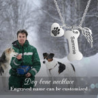 Close up of personalized dog bone charm showing detailed paw print accent.