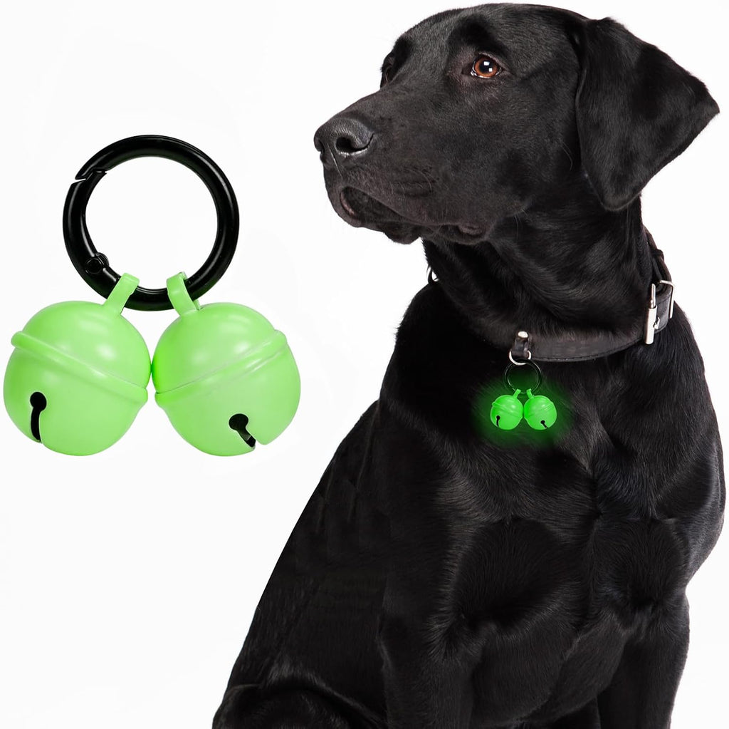 Whimsii dog collar bell front view showcasing green glow copper finish and attachment clasp