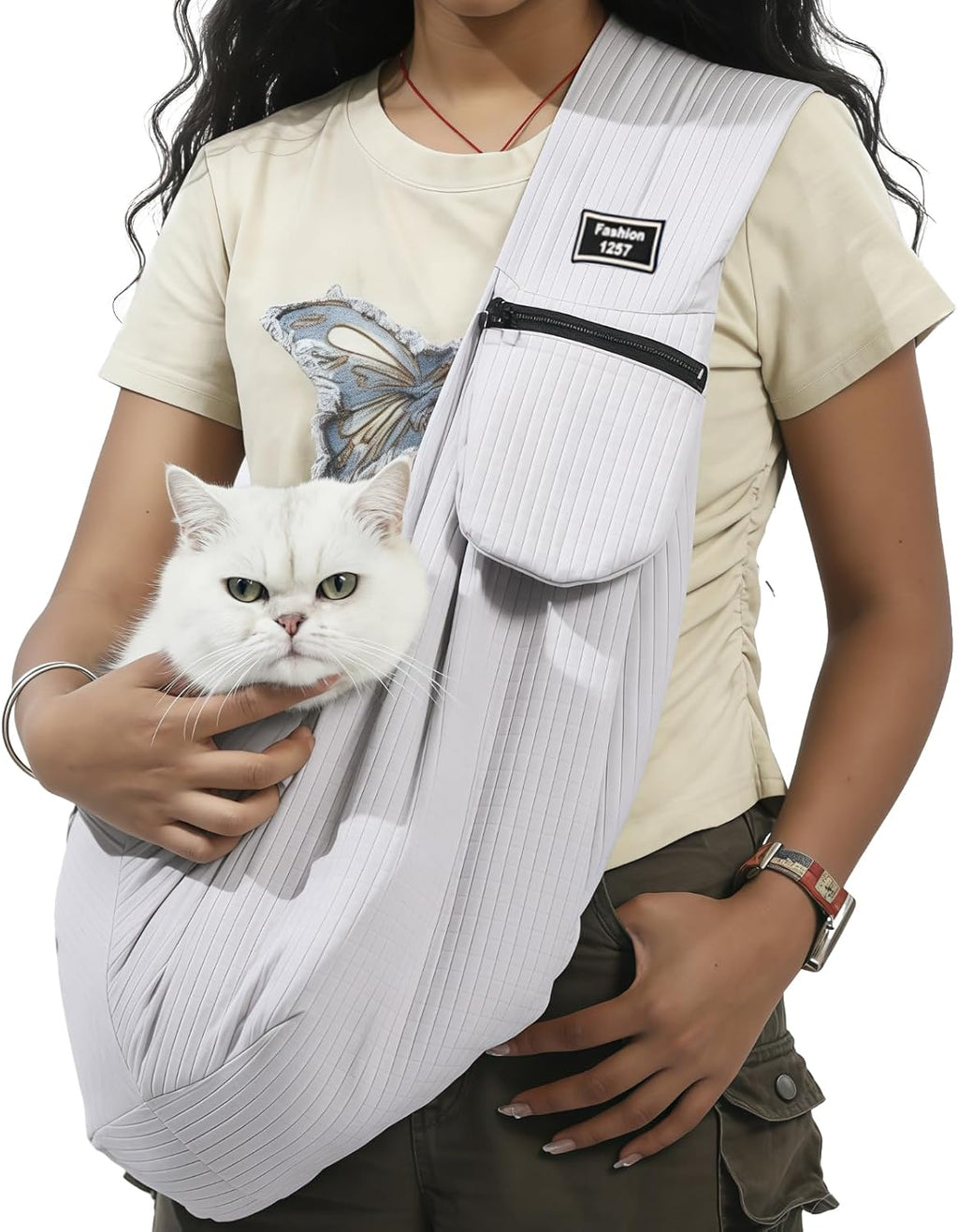 Woman wearing pink dog sling carrier for hands-free travel