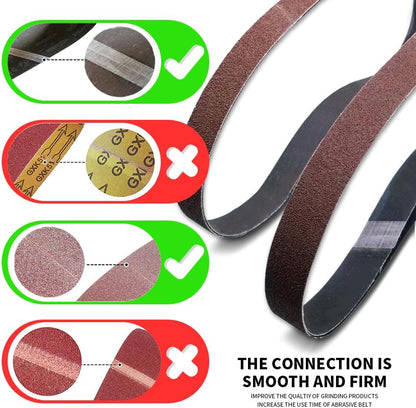 Sixty piece assortment of premium one half inch by eighteen inch abrasive belts stacked by grit size.