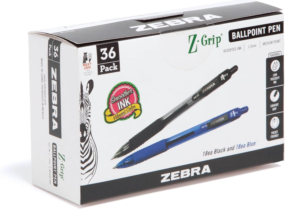 Zebra retractable black ballpoint pen placed next to a journaling notebook