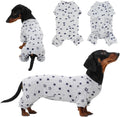 T'CHAQUE Classic Star Dachshund Pajamas front view on a miniature wiener dog.
