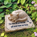 Carchistan pet memorial stone placed on a green lawn patio area