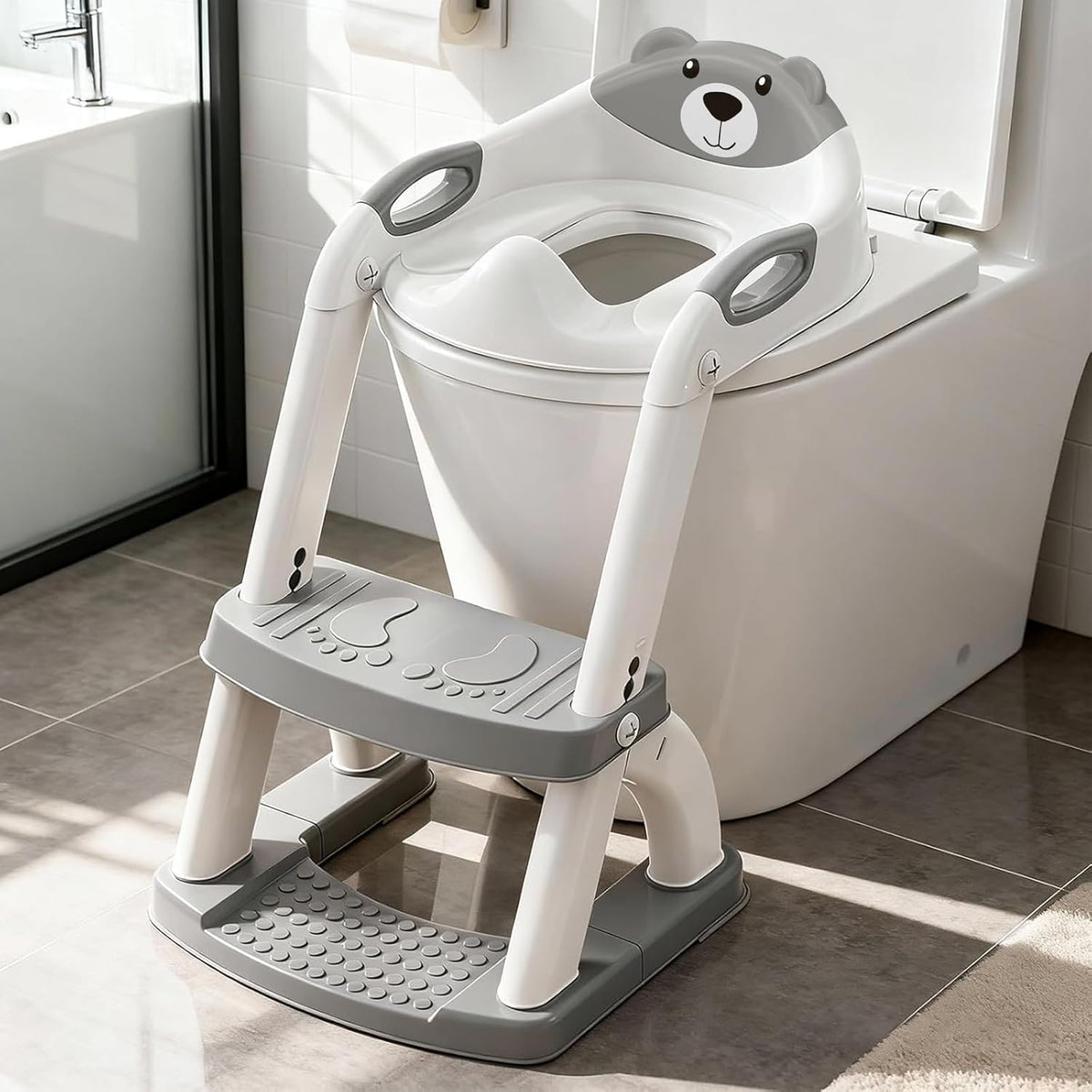 SKYROKU potty training toilet seat front view with step stool ladder in enamel grey.