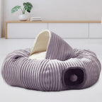Plush grey kitten tunnel bed with hanging ball toy at entrance