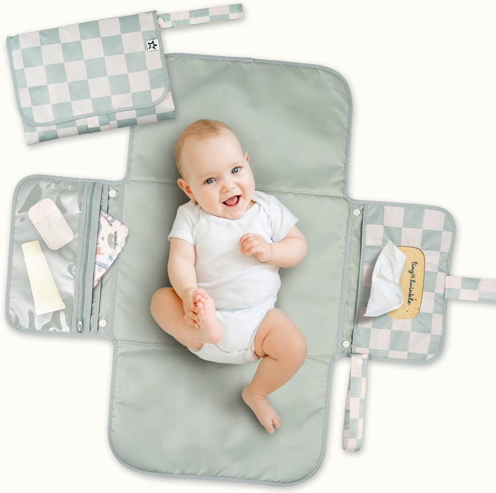 Tiny Twinkle Portable Diaper Changing Pad in Sage Checkers front view showing compact folded design.