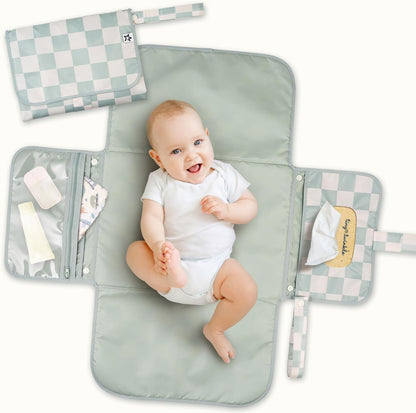 Tiny Twinkle Portable Diaper Changing Pad in Sage Checkers front view showing compact folded design.