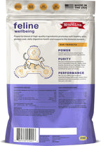 Healthy adult cat enjoying a meal mixed with nutritional superfood supplement powder.