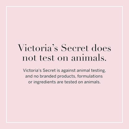 Victoria's Secret Velvet Petals bottle held close to show the liquid formulation transparency.