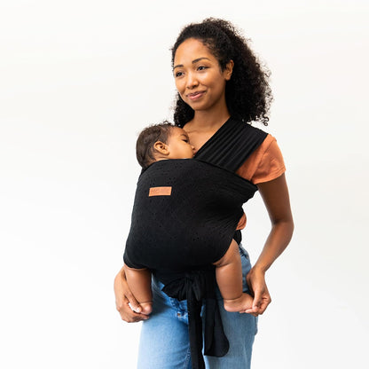 MOBY Easy Wrap Carrier Petunia Bottom Black Eyelet front view on parent