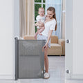 BabyBond retractable baby gate front view showcasing sleek grey mesh barrier