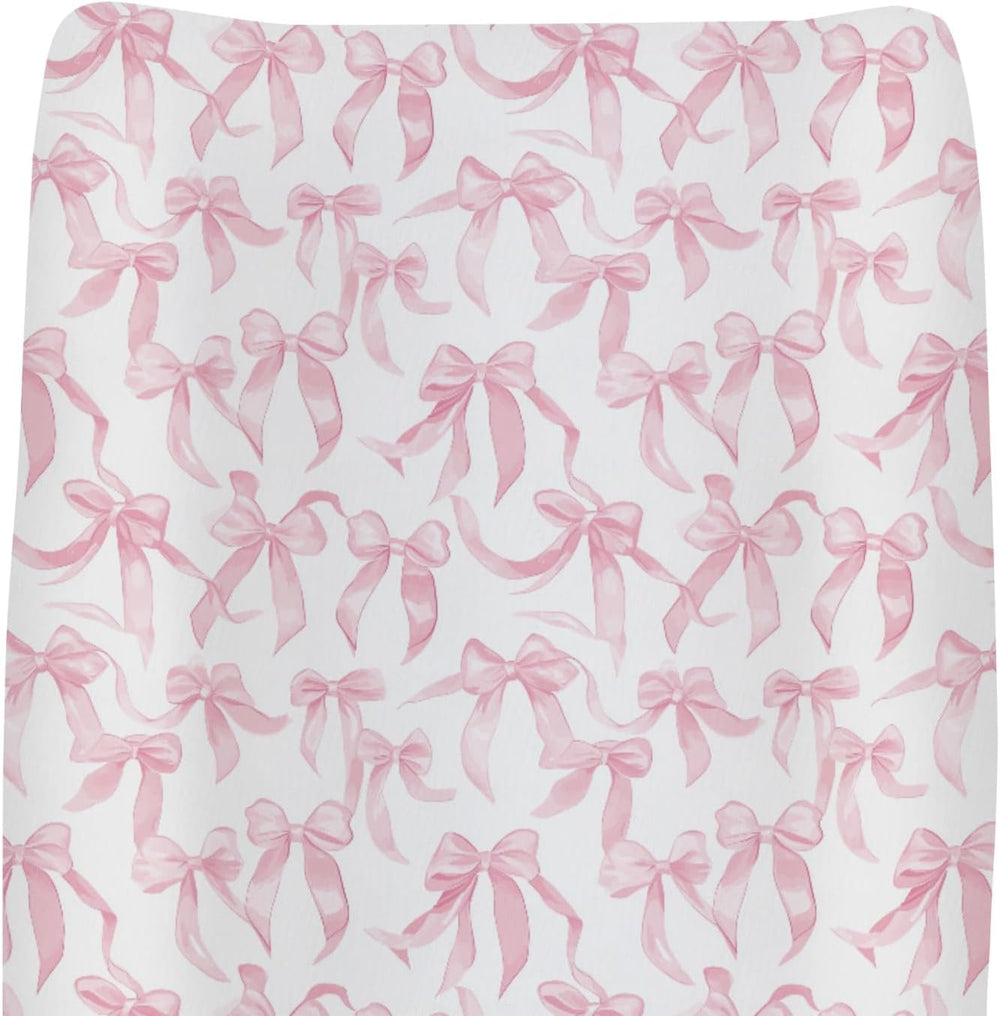 ZoUbqchY baby changing pad cover front view with pink bows pattern.