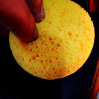 Multipurpose household tile and whiteboard cleaning yellow sponges.