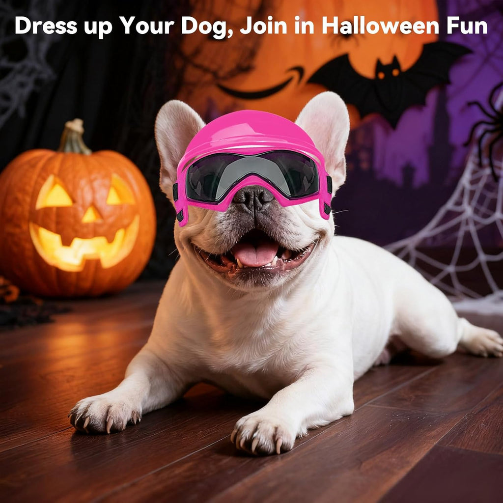 French bulldog wearing pink pet motorcycle safety helmet and goggles