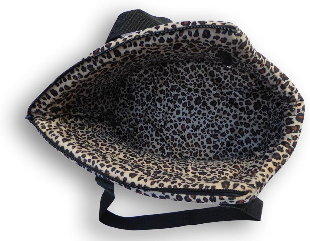 Interior view of HDP pet carrier with leopard print lining.