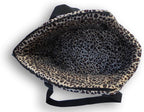 Interior view of HDP pet carrier with leopard print lining.