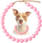 Detailing of the premium imitation pearls used in the decorative puppy jewelry piece.