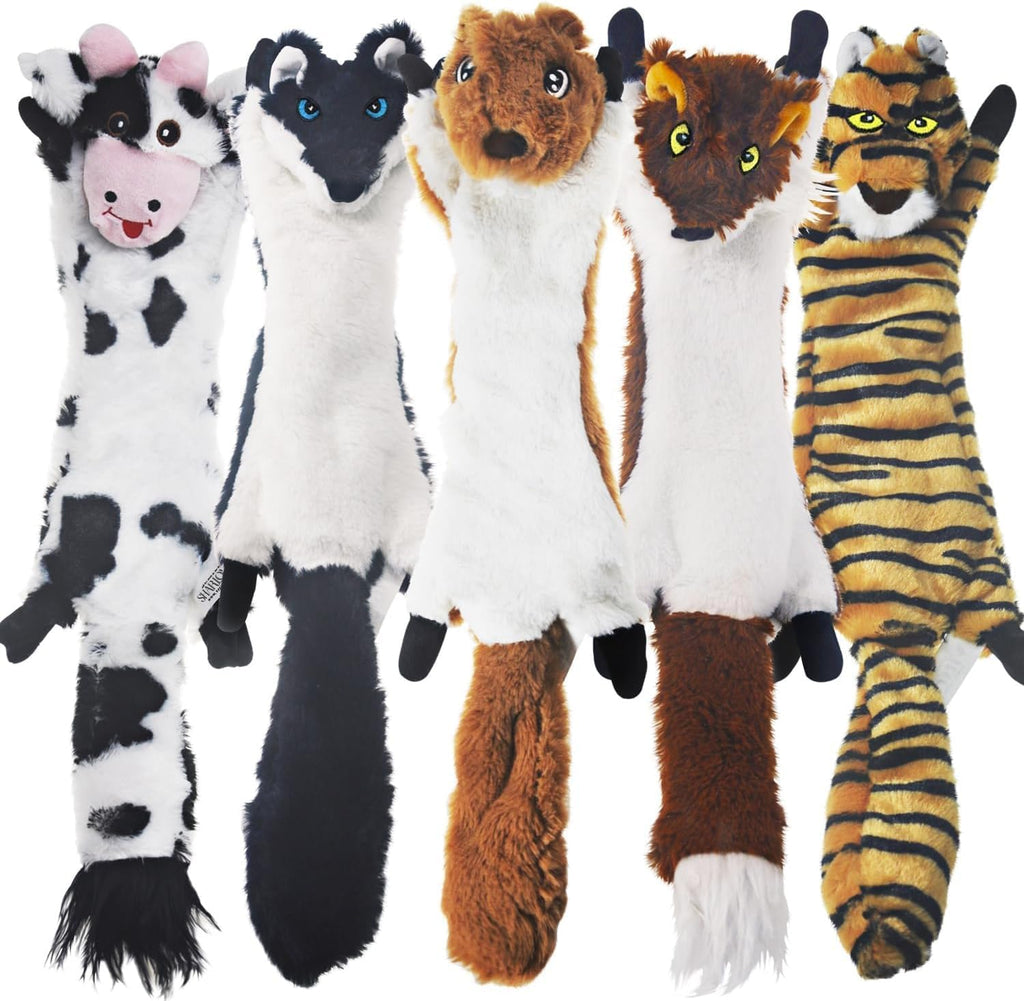 Plush crinkle dog toys without stuffing laid out to display wolf and fox variants