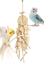 Bird playing with Vildroohowl corn husk foraging toy.