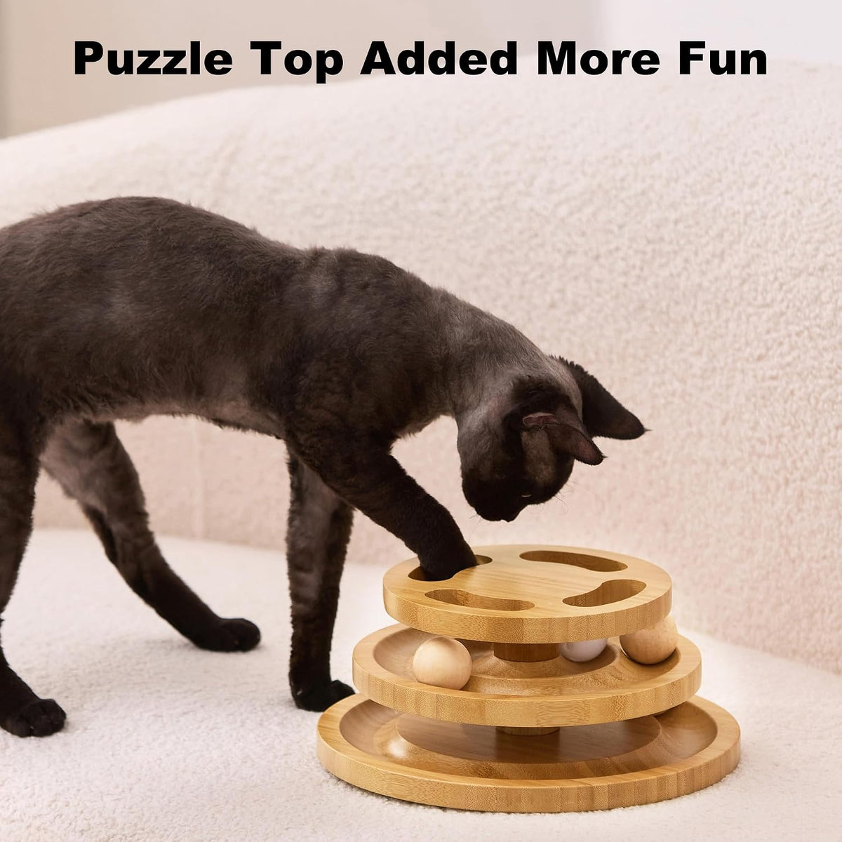 Three level wooden cat ball tower showing tracks and spinning balls