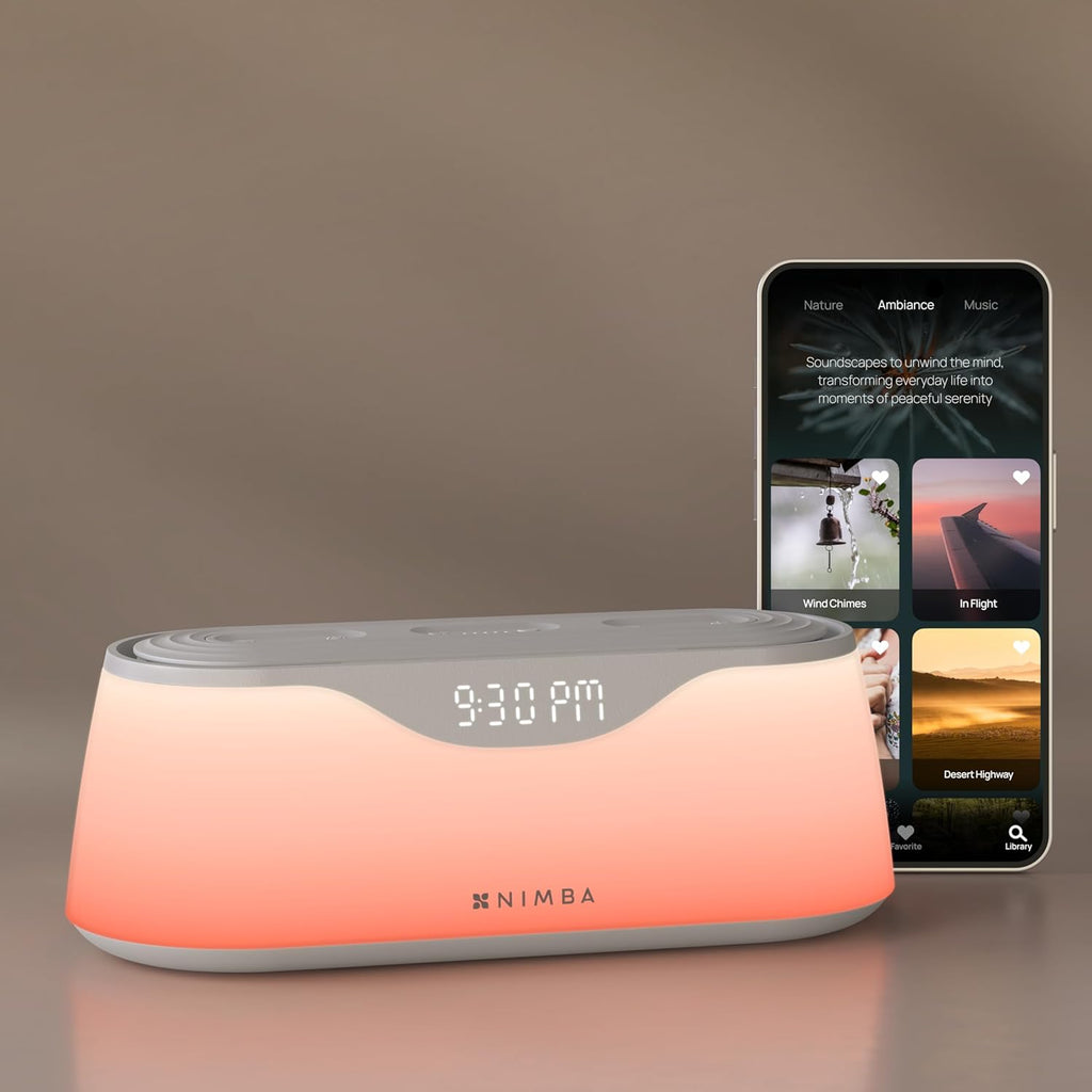Nimba OFLO sunrise alarm clock front view displaying glowing warm light therapy mode