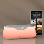 Nimba OFLO sunrise alarm clock front view displaying glowing warm light therapy mode