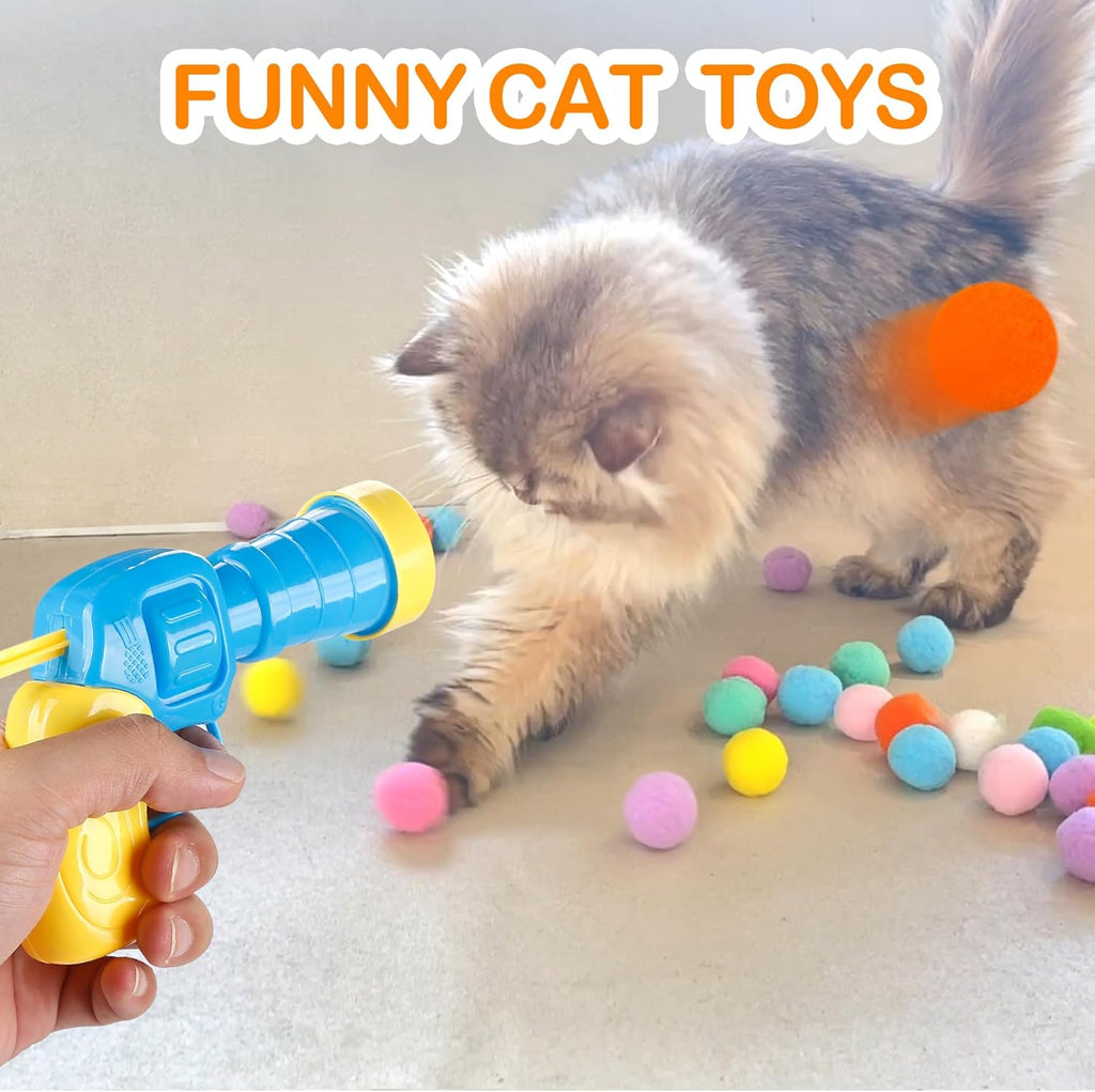 MeoHui interactive kitty toy launcher being operated to shoot silent plush poms.