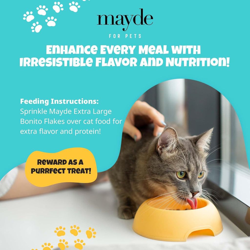 Cat enjoying Mayde bonito flakes treat