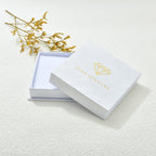 KZX mountain range pet jewelry piece resting on a flat neutral background for clear visualization