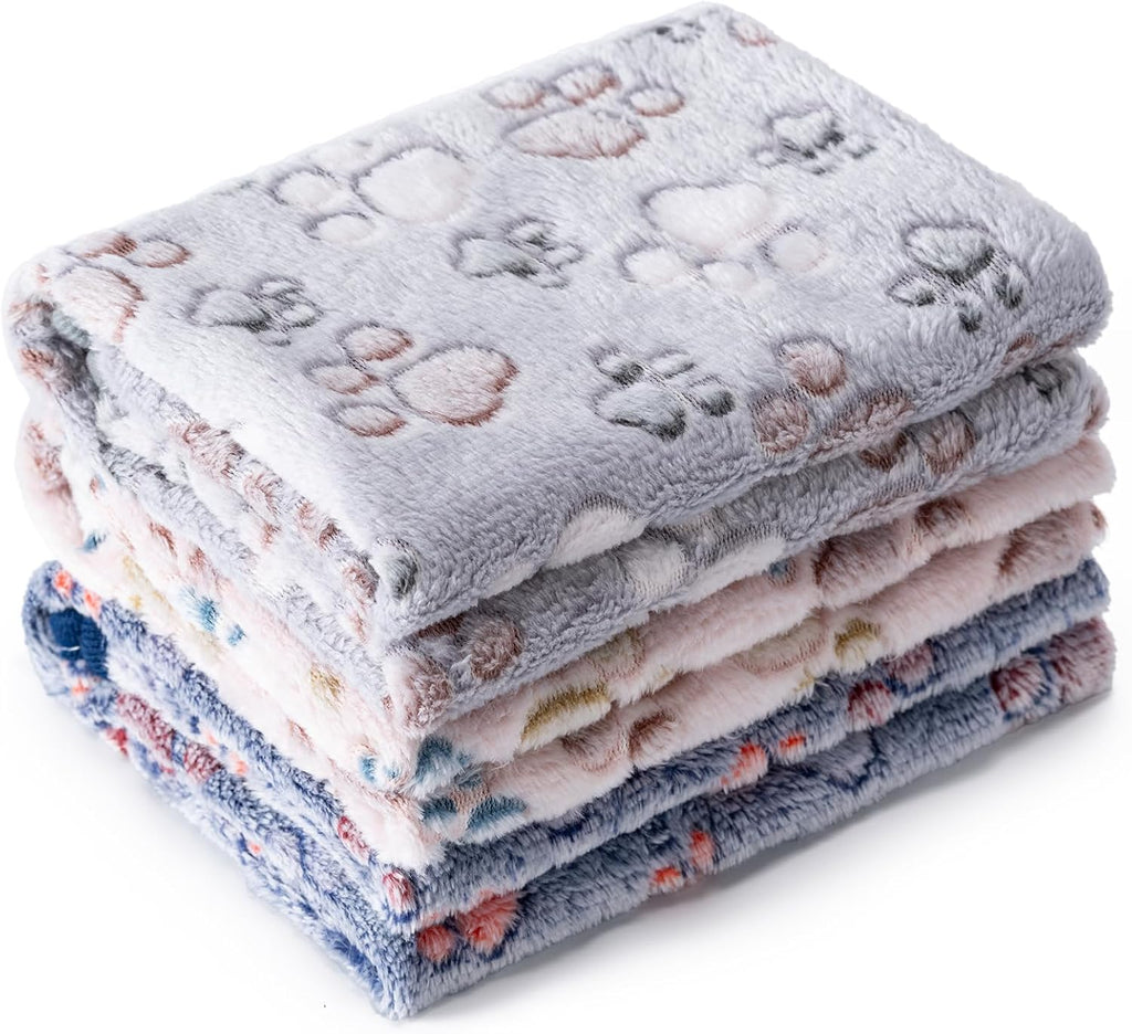 Three pack of premium fluffy pet blankets arranged neatly for puppies