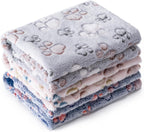 Three pack of premium fluffy pet blankets arranged neatly for puppies