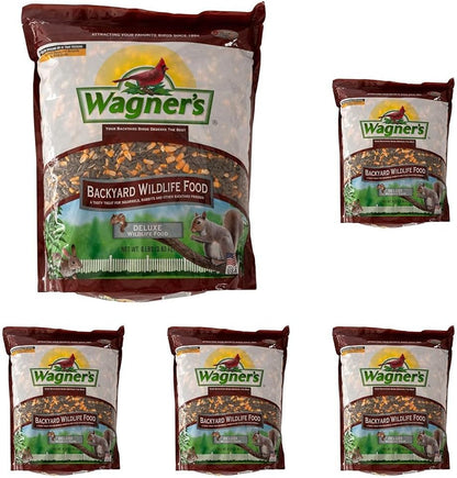 Small rabbits enjoying Wagner wildlife food outdoors