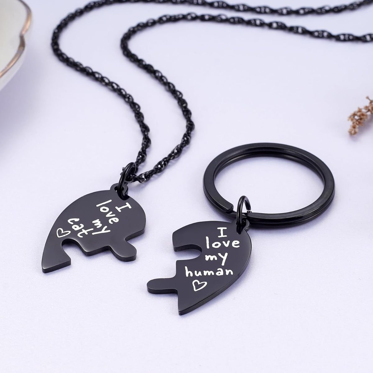 Close up of the matching friendship jewelry set for pet lovers.