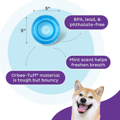 Dog playing with Outward Hound treat dispensing ball