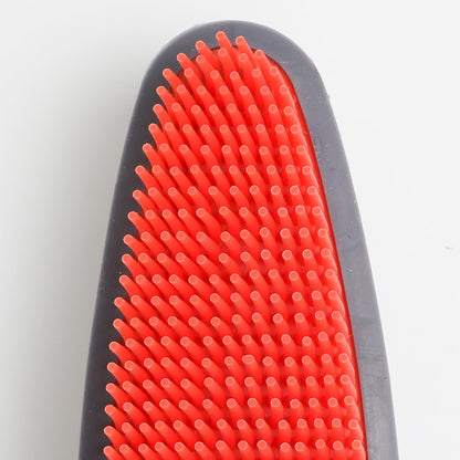 Godiyyer rubber brush used as a cat massage tool