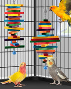 Multicolored wooden bird toy hanging inside a pet parrot cage