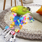 Katumo bird toy showing hanging metal spoons and wooden cork details