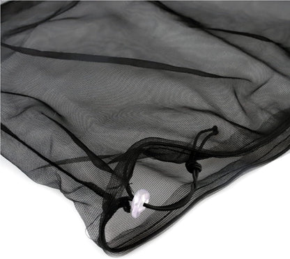 Black nylon mesh bird cage net cover protecting home flooring from scattered seeds and feathers